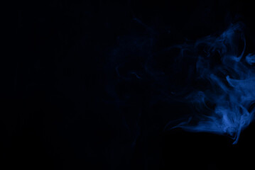 Blue and pink steam on a black background.