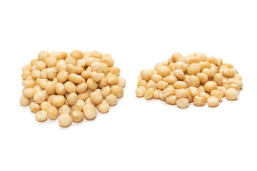 Macadamia nuts isolated on white background.