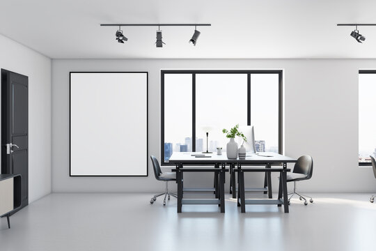 Blank white poster in black frame on light wall in sunny stylish office with monochrome interior design, modern work space on glossy light floor. 3D rendering, mockup