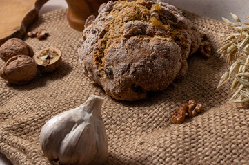 Rye bread with walnuts and garlic on the sack