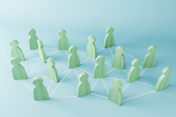Business teamwork concept with green wooden human figures on light blue background with white lines