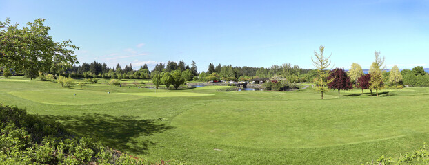 Panoramic view of Scenic Golf course at Victoria, Canada on a beautiful spring day. Vancouver Island is temperate enough for year round golfing.    
