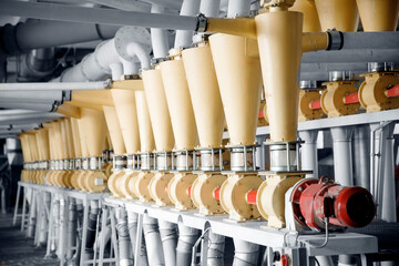 Modern electrical mill machinery for production of wheat flour. Equipment Factory Grain