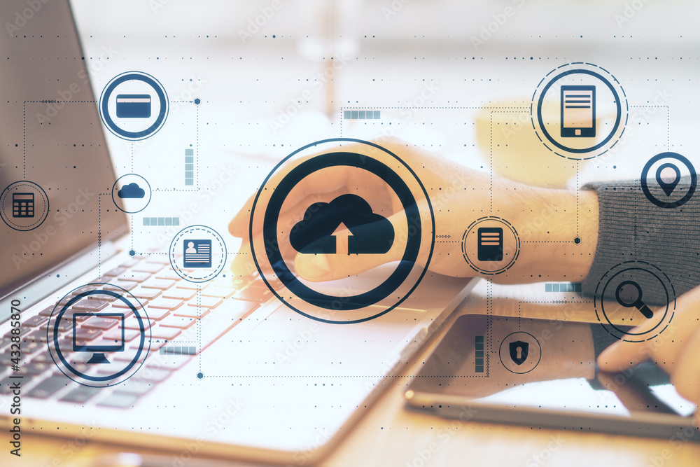 Poster Schematic structure of cloud storage with technological icons on digital screen at human hands on laptop keyboard background, cloud technology concept. Double exposure.