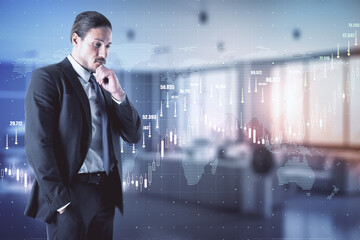 Businessman in a suit standing and thinking in an office room with a raising chart in the background. Trading and market analysis concept