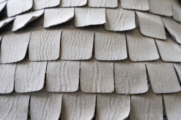 Grey square petals cushion. Gray texture background, textile fabric concepts