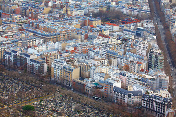 Aerial panorama of Paris streets and houses . Montparnasse Cemetery .  Aerial view of 14th arrondissement of Paris - obrazy, fototapety, plakaty