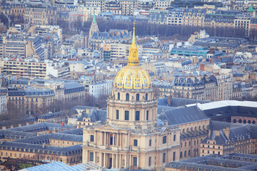 Fototapeta na wymiar Invalides Cathedral with golden cupola in Paris . 7th arrondissement of Paris . Aerial view of France capital city downtown