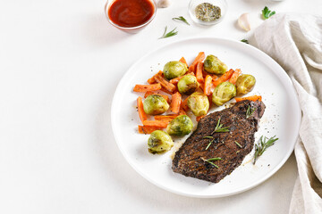 Beef steak with brussels sprouts and sweet potatoes