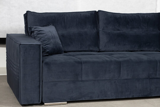 Stylish Blue Velvet Couch For A Modern Living Room Interior