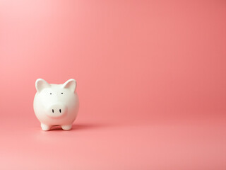 Piggy bank in pink background minimal style, Business, finance, investment, saving and corruption concept.