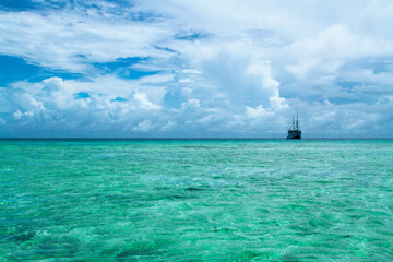 Advertising, Travel, Vacation and Holiday Concept - Beautiful pristine ocean view from a small remote island