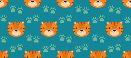Cute seamless pattern with smiling baby tiger face head and cat paw print. Vector illustration blue background. Sweet childish backdrop.