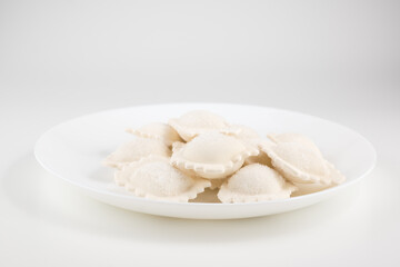 Fototapeta na wymiar frozen dumpling covered with frost isolated