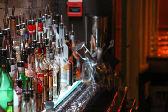 A line of spirit bottles in a bar ready for customers post-lockdown