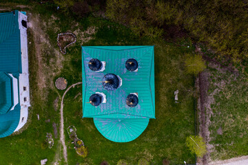 a panoramic view of the historical center of the temples and monasteries of the city of Suzdal in the rain filmed from a drone 