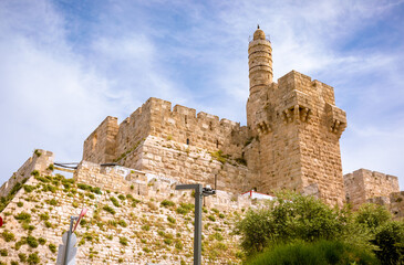 The Tower of David, also known as the Citadel, is an ancient citadel located near the Jaffa Gate entrance to the Old City of Jerusalem. Cloudy sky on the background  May 2021