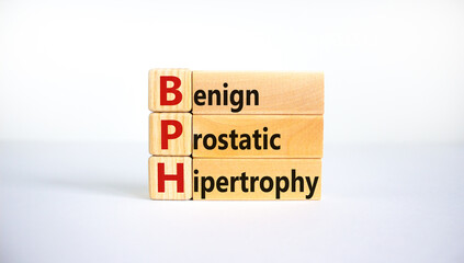 Medical and BPH, Benign Prostatic Hypertrophy symbol. Wooden blocks with the word 'BPH'. Beautiful white background. Copy space. Medical and BPH, Benign Prostatic Hypertrophy concept.