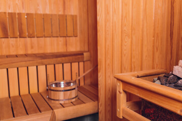 Fototapeta na wymiar Sauna interior - Relax in a hot sauna.