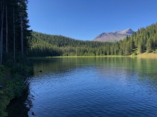 Fototapeta na wymiar Chinook Allison Lake near Crowsnest Pass, Alberta, Canada. Chinook Lake is one of the most popular campgrounds in the Crowsnest Pass area