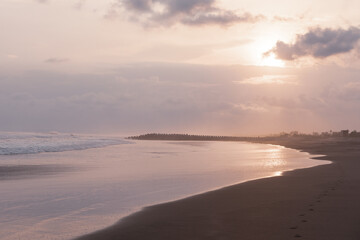 Fototapeta na wymiar Sunset on the beaches of Pandagaran in Java, Indonesia