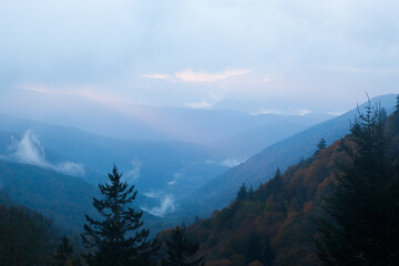 Sunrise in a mountain mist