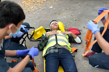 Emergency Medical First aid for head injuries of worker accident in work, Loss of feeling or loss...