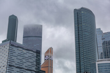 Glass skyscraper of the Moscow City business center in cloudy weather. Russia