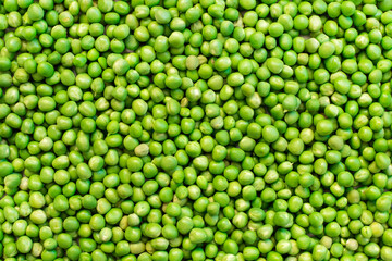 Obraz na płótnie Canvas Background and texture of green peas. 