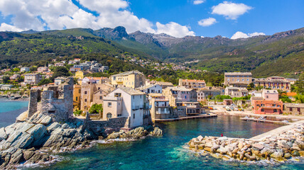 Corsica, Drone view of the village of Erbalunga and its Genoese tower. Erbalunga is a charming village of character on the Corsican coast, remarkable for its ruined Genoese tower 