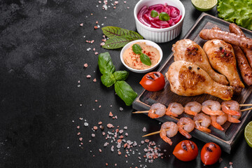 Composition of sausages, chicken, pork and shrimp prepared on grill, as well as vegetables prepared on grill with spices and herbs
