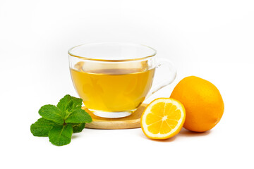 Cup of aromatic tea, mint leaves and lemon slice isolated on white background. Part of set.
