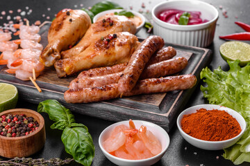 Composition of sausages, chicken, pork and shrimp prepared on grill, as well as vegetables prepared on grill with spices and herbs