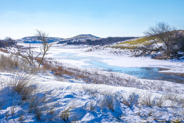 Snowy and ice winter landscape at the Amsterdamse Waterleidingduinen