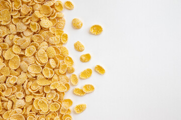 corn flakes background, frame of cornflakes on white
