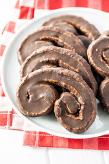Sweet pastry palmeritas with chocolate icing.