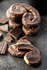 Sweet pastry palmeritas with chocolate icing.