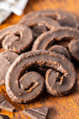 Sweet pastry palmeritas with chocolate icing.