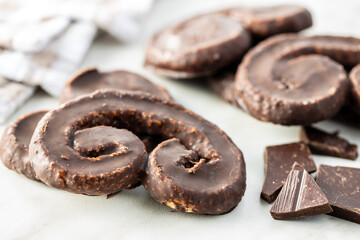 Sweet pastry palmeritas with chocolate icing.