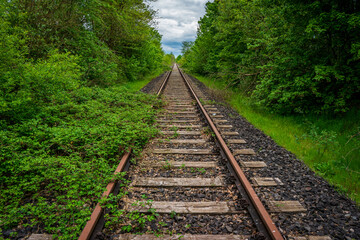 Obraz premium old rusty and abandoned railway line
