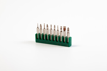 A set of screwdriver bits for a magnetic screwdriver on a white background