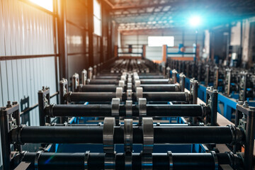 Fototapeta premium equipment and modern production line of rolling metal roofing profile sheets