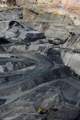 Machines working in open pit coal mine - obrazy, fototapety, plakaty