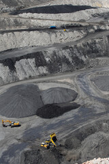 Machines working in open pit coal mine