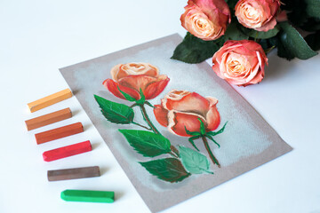 Painting at home. Soft pastel painting of roses.