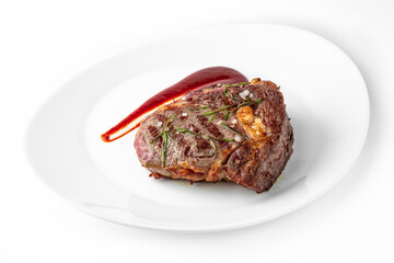 Dry aged beef steak Medium Rare. Banquet festive dishes. Gourmet restaurant menu. White background.