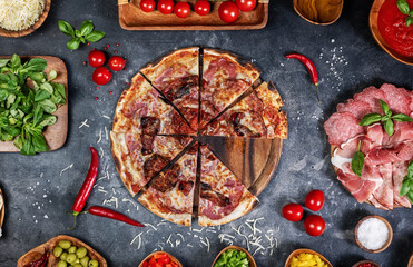 Handmade pizza on dark background