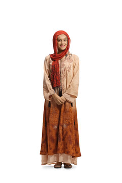 Full length portrait of a young muslim woman in traditional clothes