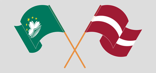 Crossed and waving flags of Macau and Latvia