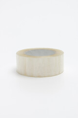 A roll of adhesive scotch tape isolated on white background. Scotch tape on a white background.